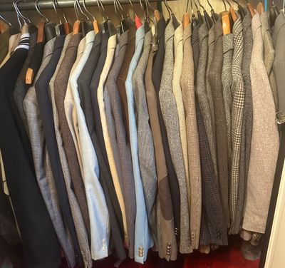 Sale Photo Thumbnail #15: Closet filled with assorted men's suit jackets and blazers in various tweed, plaid, and solid patterns.
