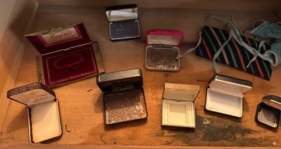 Sale Photo Thumbnail #145: Collection of vintage empty jewelry and watch boxes, including a red velvet-lined Longines box and various hardshell presentation cases.
