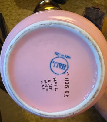 Sale Photo Thumbnail #6: Underside of a vintage pink Hall 6-cup teapot 