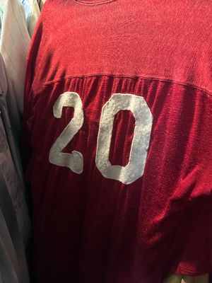 Sale Photo Thumbnail #96: Vintage red jersey with white felt stitched number 20 