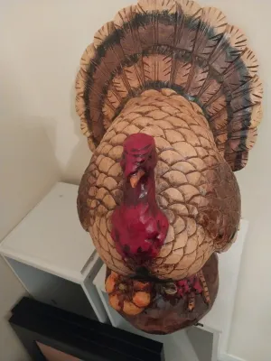 Sale Photo Thumbnail #59: Hand-carved and painted wooden turkey sculpture featuring detailed feather textures, a fan tail, and a base decorated with pumpkins.