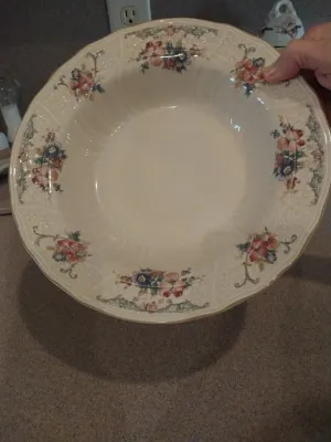 Sale Photo Thumbnail #27: Vintage ceramic serving bowl featuring a floral rim pattern and scalloped edges.