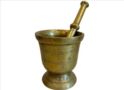 Sale Photo Thumbnail #83: Vintage heavy brass mortar and pestle set with incised line accents and natural patina throughout.