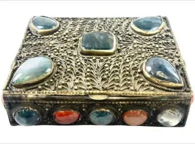 Sale Photo Thumbnail #94: Vintage brass or bronze filigree trinket box encrusted with polished gemstone cabochons on the lid and sides.