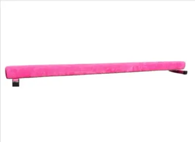 Sale Photo Thumbnail #34: Portable low balance beam for gymnastics practice, featuring a bright pink suede-like cover and low-profile black metal support legs.