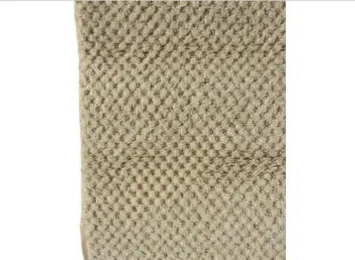 Sale Photo Thumbnail #52: Close-up detail of a beige textured area rug with a repeating diamond lattice pattern.