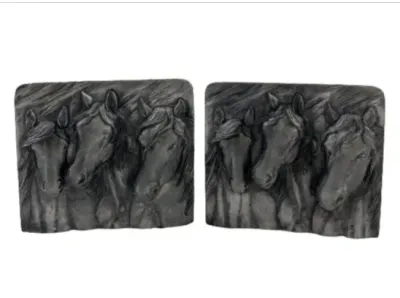 Sale Photo Thumbnail #88: Pair of cast metal or resin bookends depicting relief-carved horse heads.