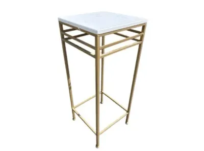 Sale Photo Thumbnail #40: Modern gold-toned metal pedestal table featuring a square white marble top.