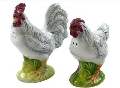 Sale Photo Thumbnail #105: Vintage ceramic rooster and hen salt and pepper shakers with hand-painted details and glossy finish.