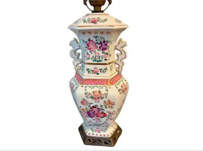 Sale Photo Thumbnail #63: Vintage Famille Rose style ceramic table lamp with floral motifs, scroll side handles, and a gilded brass base.