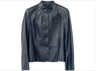 Sale Photo Thumbnail #146: Black leather jacket featuring a mandarin collar, button front closure, and radial stitched seam detailing at the yoke.