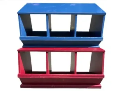 Sale Photo Thumbnail #185: Pair of stackable painted wooden storage bins with three compartments each, one in blue and one in red.