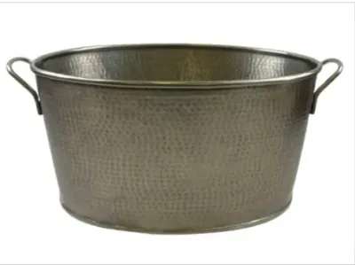 Sale Photo Thumbnail #134: Large hammered metal beverage tub with dual side handles and an antique bronze or pewter finish.