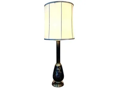 Sale Photo Thumbnail #61: Vintage table lamp featuring a dark faux-marble bulbous base, brass accents, and a tall cream-colored drum shade with dark piping.