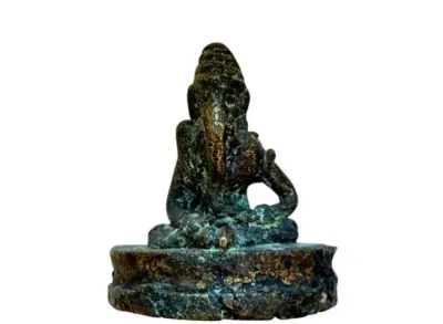 Sale Photo Thumbnail #99: Antique small bronze figure of Lord Ganesha displaying a heavy green patina and age-worn surface details.