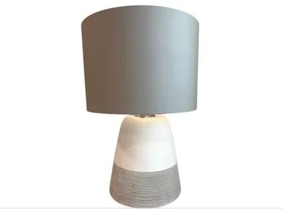 Sale Photo Thumbnail #59: Contemporary ceramic table lamp featuring a two-tone white and ridged grey base, topped with a matching grey drum shade.