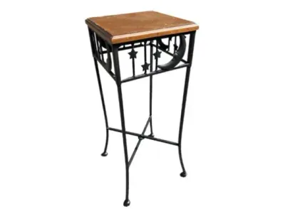 Sale Photo Thumbnail #38: Celestial-themed wrought iron plant stand or accent table with a square wooden top. The black metal frame features cutouts of crescent moons and stars around the upper apron.