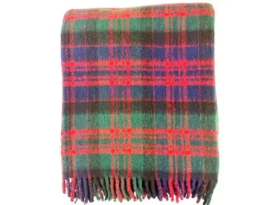 Sale Photo Thumbnail #140: Folded wool plaid throw blanket featuring a classic tartan pattern in green, blue, and red with fringed edges.