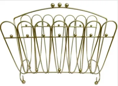 Sale Photo Thumbnail #170: Mid-century modern brass wire magazine rack with looped design and decorative ball accents.