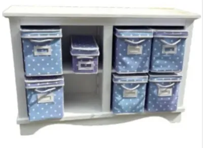 Sale Photo Thumbnail #45: White wooden storage console unit with open shelving filled with blue polka-dot fabric bin drawers.