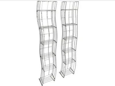 Sale Photo Thumbnail #174: Pair of modern chrome wire CD or DVD storage towers with wavy side frames and multiple tiers.