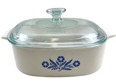 Sale Photo Thumbnail #117: Vintage Corning Ware Cornflower Blue square casserole dish complete with a clear glass lid.