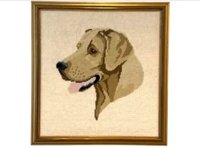 Sale Photo Thumbnail #76: Framed vintage needlepoint portrait depicting a yellow Labrador Retriever in profile, set in a gold-finished wooden frame.