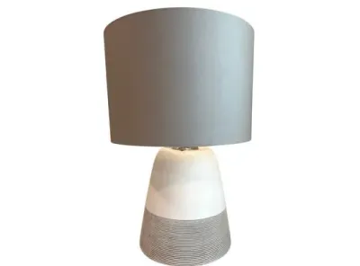 Sale Photo Thumbnail #58: Modern ceramic table lamp with a two-tone white and textured grey base, paired with a matching grey drum shade.