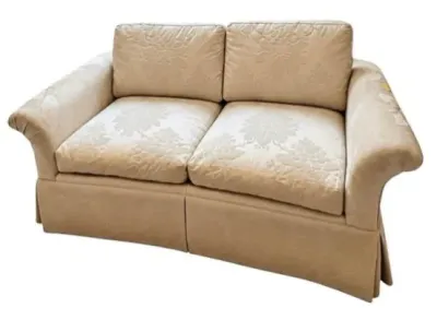 Sale Photo Thumbnail #4: Cream-colored two-cushion loveseat featuring a subtle floral jacquard fabric, rolled arms, and a tailored pleated skirt.