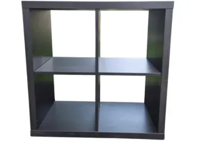 Sale Photo Thumbnail #183: Black modern four-cube organizer shelf unit in good condition.