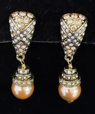 Sale Photo Thumbnail #94: Pair of vintage-style drop earrings featuring champagne-tone rhinestones, beaded accents, and faux pearl drops.
