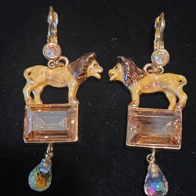 Sale Photo Thumbnail #29: Pair of whimsical enamel lion drop earrings with amber emerald-cut crystals and iridescent aurora borealis teardrop accents.