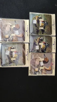 Set of five vintage 'A Switch in Art' decorative switch plates featuring waterfowl illustrations, still sealed in original...