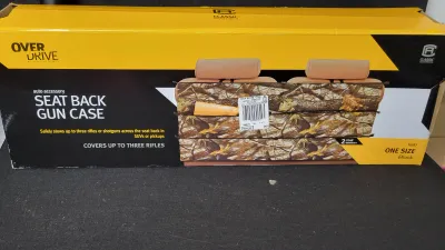 Classic Accessories OverDrive seat back gun case, new in original box. Designed in camouflage pattern to hold up to three rifles or...