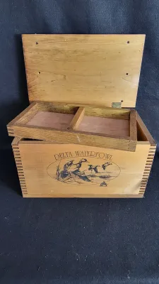 Vintage Delta Waterfowl wooden storage box featuring finger-joint construction, a hinged lid, and a removable upper tray.