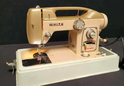 WHITE ELECTRIC SEWING MACHINE 