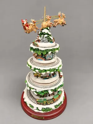 THOMAS KINKADE WONDERLAND EXPRESS MUSICAL CHRISTMAS TREE WITH TRAINS