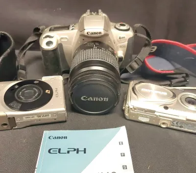 CANNON AND OLYMPUS CAMERAS