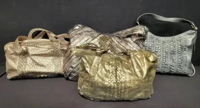 METALLIC PURSE LOT (4)