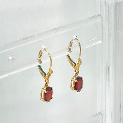 LOT 74: Gold and Garnet Lever Back Pierced Earrings - 14KT, 1.4 GTW