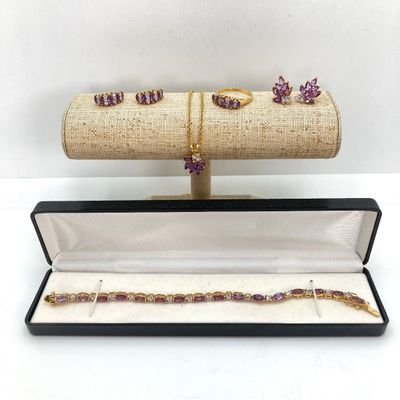 LOT 32: Gold Tone and Purple Stone Jewelry Set - Necklace 18", Ring, Bracelet and Two Pairs of Earrings