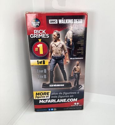 LOT 532: Classic Entertainment Collection - "Rick Grimes" Figurine in Original Box, VHS Disney's The Little Mermaid Movie,...