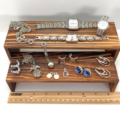 LOT 529: Large Collection of Silver Tone Jewelry - Earrings, Necklaces (Locket with Paper Scroll) and Fashion Watches