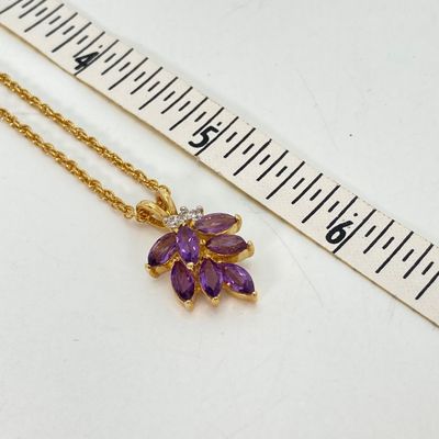 LOT 32: Gold Tone and Purple Stone Jewelry Set - Necklace 18", Ring, Bracelet and Two Pairs of Earrings