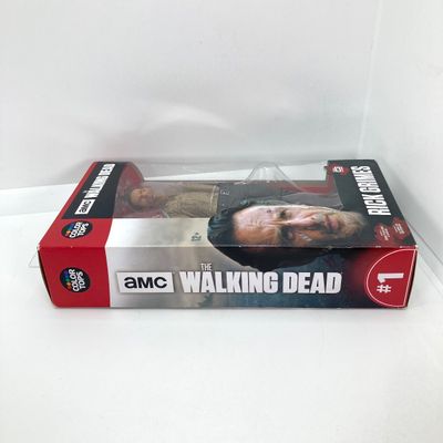 LOT 532: Classic Entertainment Collection - "Rick Grimes" Figurine in Original Box, VHS Disney's The Little Mermaid Movie,...