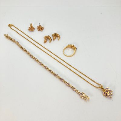 LOT 32: Gold Tone and Purple Stone Jewelry Set - Necklace 18", Ring, Bracelet and Two Pairs of Earrings