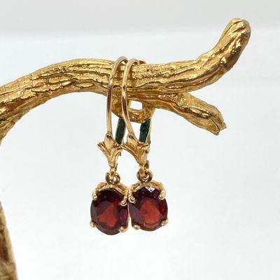 LOT 74: Gold and Garnet Lever Back Pierced Earrings - 14KT, 1.4 GTW