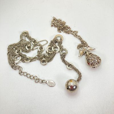LOT 529: Large Collection of Silver Tone Jewelry - Earrings, Necklaces (Locket with Paper Scroll) and Fashion Watches