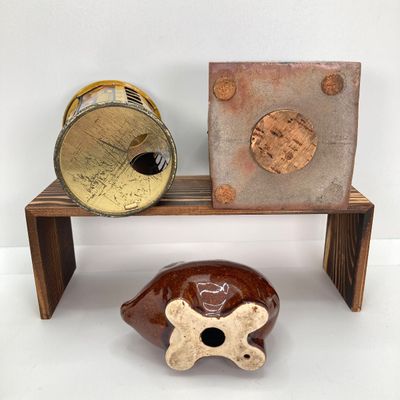 LOT 531: Vintage Coin Bank Collection - Tin Litho Rotary Sorter, Ceramic Cabin, Tin Litho Rotary Sorter, Rexair Vacuum and Piggy Bank
