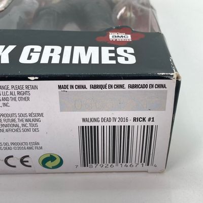 LOT 532: Classic Entertainment Collection - "Rick Grimes" Figurine in Original Box, VHS Disney's The Little Mermaid Movie,...